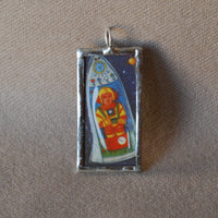 Astronaut, rocket, vintage cracker jack prize illustration, upcycled to soldered glass pendant