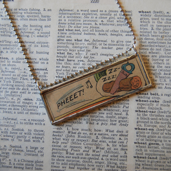 1 Sawing logs, Help help! onomatopoeia, vintage comic book illustration, upcycled to soldered glass pendant
