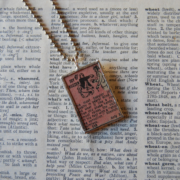 Joy Buzzer, Boomerang, vintage 1970s comic book advertisement, upcycled to soldered glass pendant