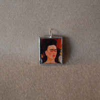 Frida Khalo, self-portrait, parrots, upcycled to hand soldered glass pendant