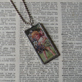 Cherub and violets illustration, up-cycled to soldered glass pendant