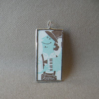 Polka band accordion player, bird with drum, vintage illustration, upcycled to soldered hand-soldered glass pendant 