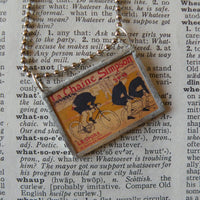 Antique bicycle, bicycling, bicyclist, bike advertising illustration, upcycled to soldered glass pendant