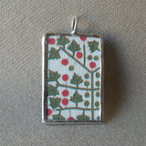 Antique quilt with floral and berry designs, American folk art image upcycled to 2-sided hand soldered glass pendant