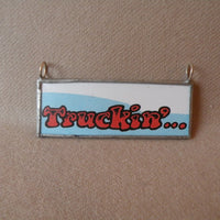 R. Crumb Truckin' illustrations from vintage postcard, upcycled to soldered glass pendant